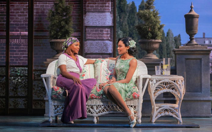 Two actors in 1920s attire on stage in The Great Gatsby musical, Broadway.
