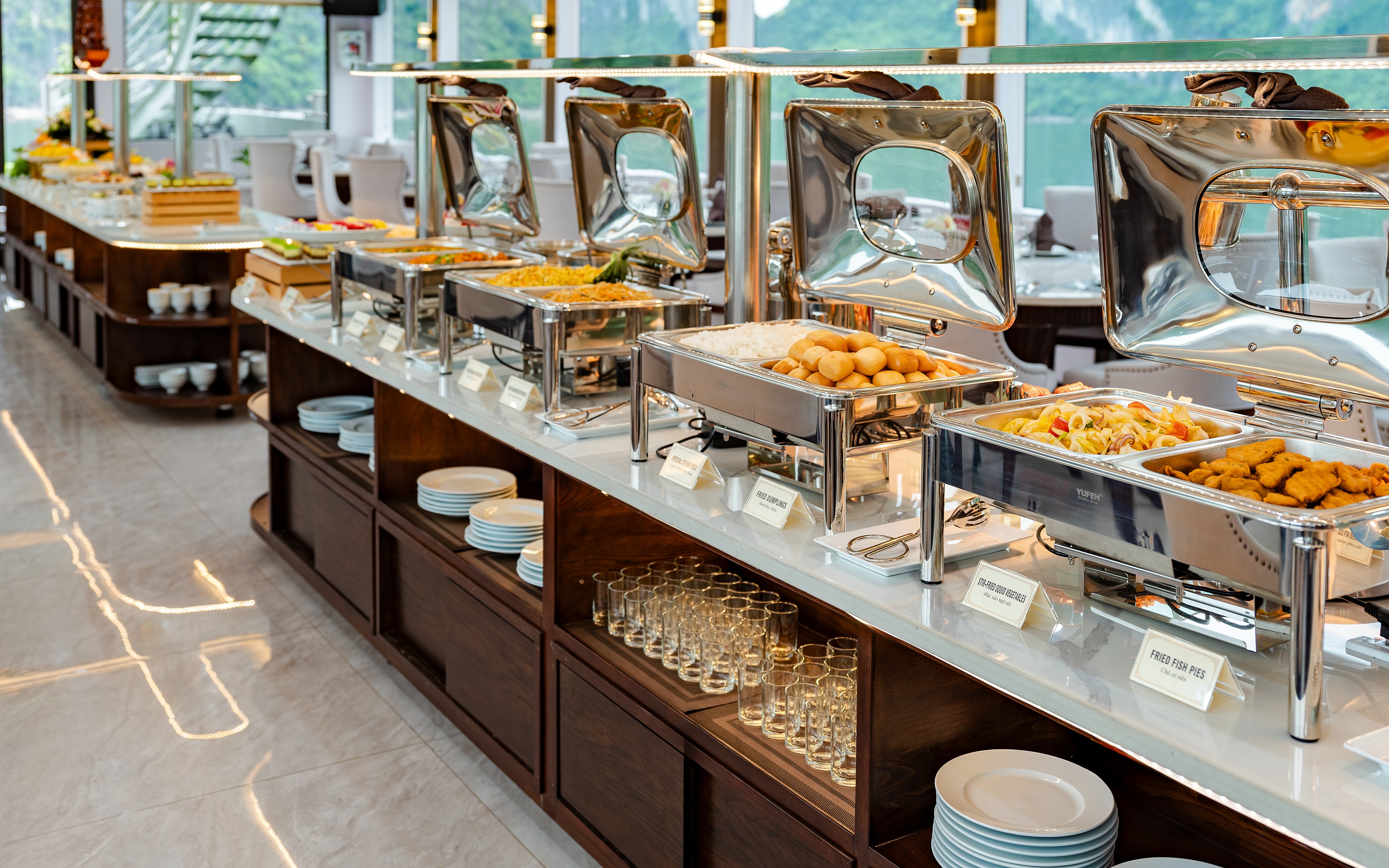 Buffet spread at Hercules premium with various dishes and serving trays.