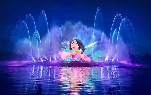 Disneyland World of Frozen Illuminations water show with character projection.