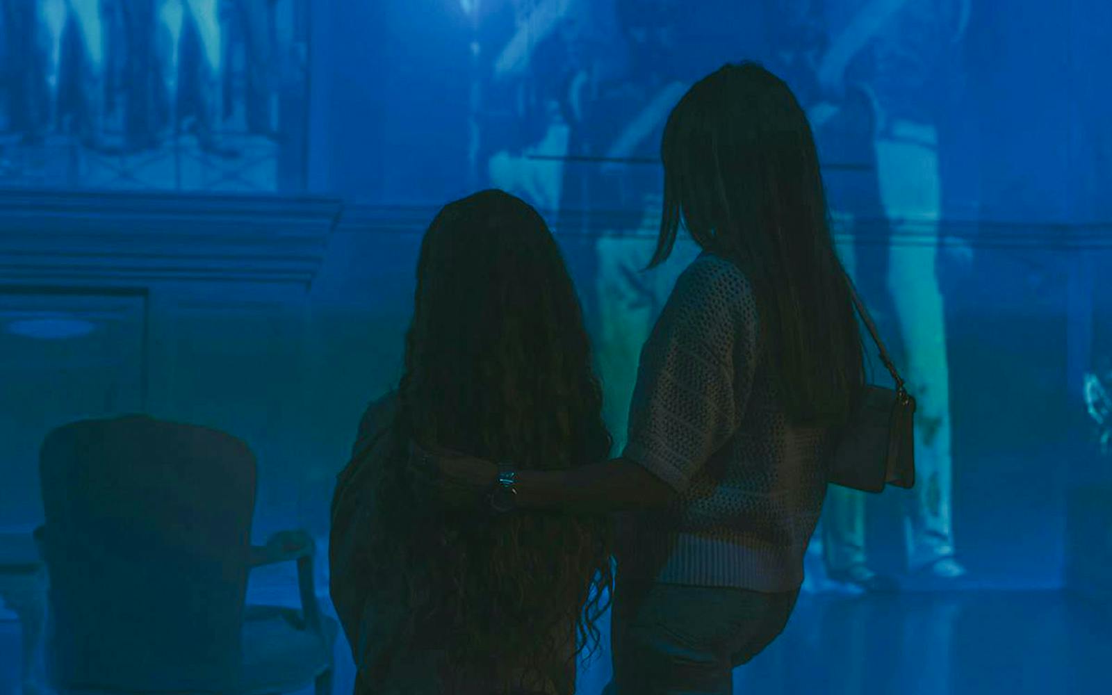 Visitors exploring an immersive exhibit at WOW Porto.