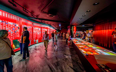 Visitors exploring exhibits at Benfica Stadium museum experience in Lisbon.