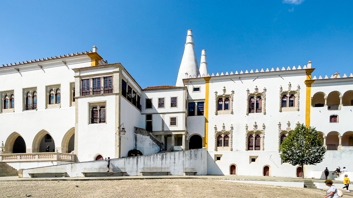 National Palace of Sintra with detailed architecture, Lisbon full-day tour highlight.
