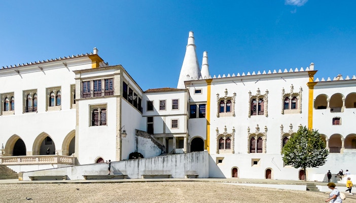 National Palace of Sintra with detailed architecture, Lisbon full-day tour highlight.