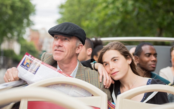 Passengers enjoying a HOHO tour bus ride in Darwin.