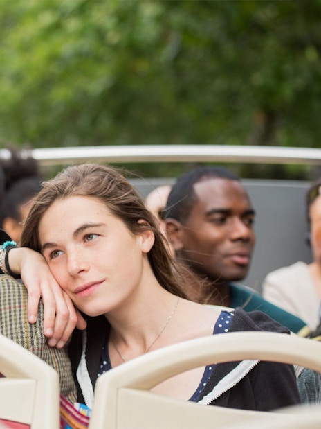 Passengers enjoying a HOHO tour bus ride in Darwin.