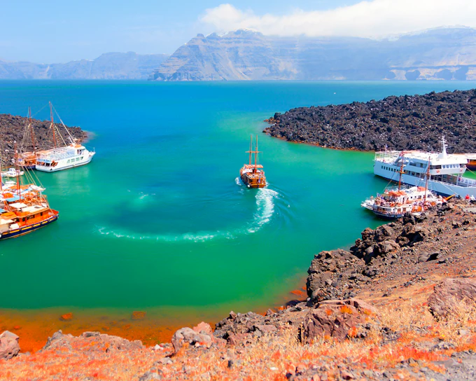 From Fira: Santorini Volcano, Hot Springs & Thirassia Day Cruise