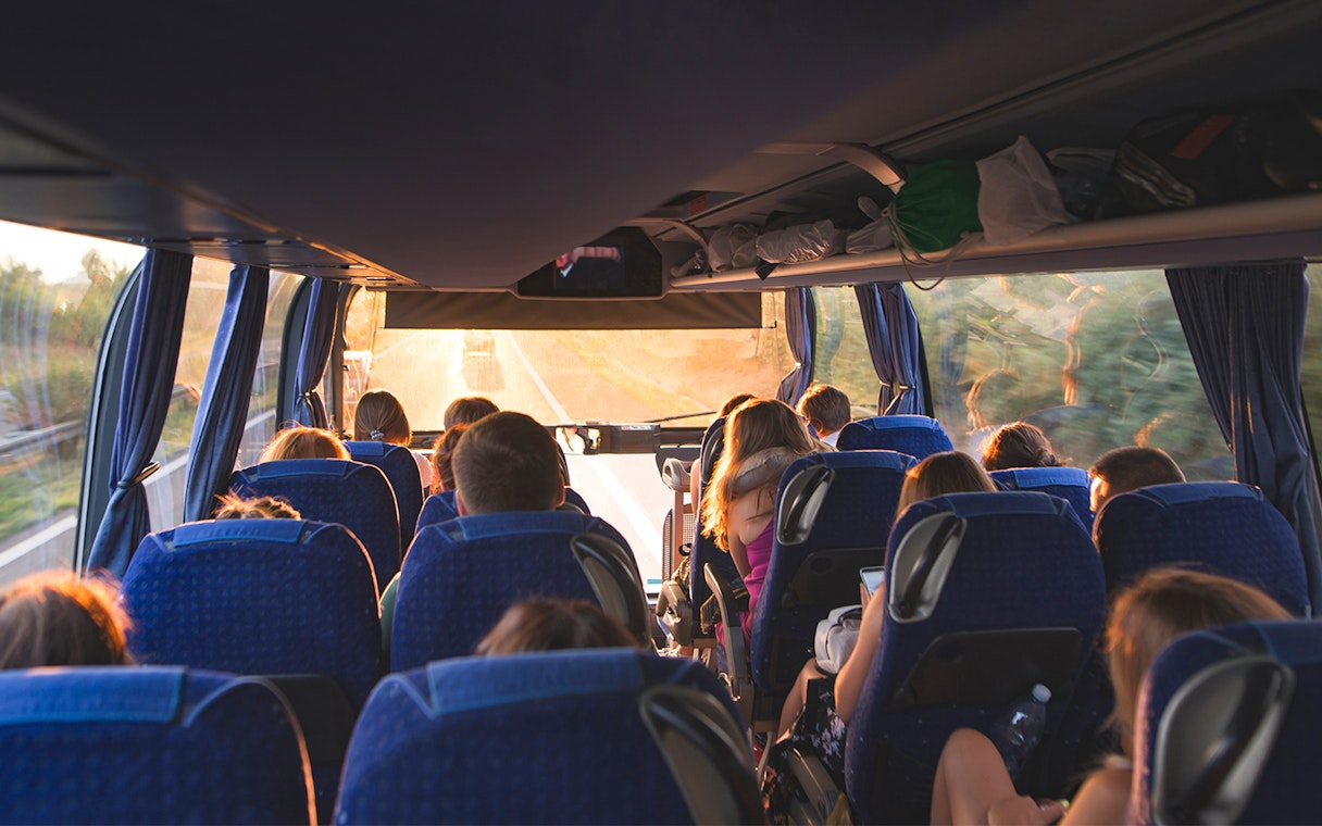 Passengers on a bus traveling from Catania Fontanarossa Airport to Catania Central Bus Station.