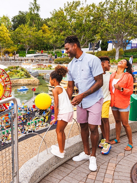 Family enjoying LEGO San Diego Fair display at MINILAND USA, LEGOLAND California.