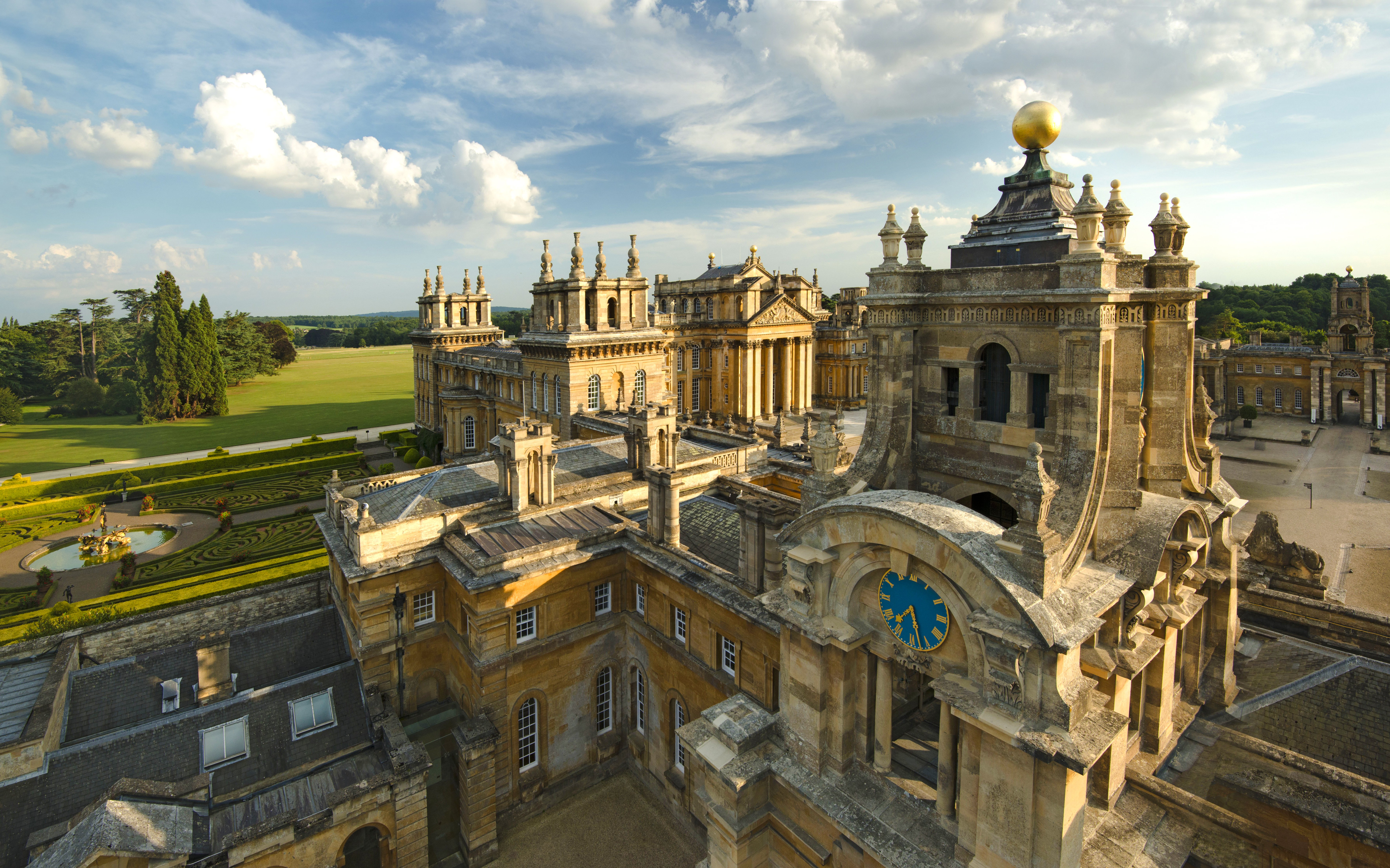 Blenheim Palace exterior with ornate architecture and gardens, Oxfordshire, England.