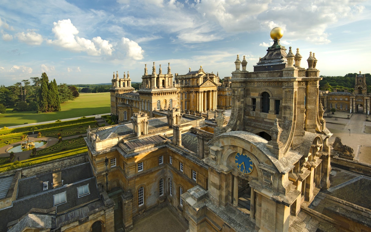 Blenheim Palace exterior with ornate architecture and gardens, Oxfordshire, England.