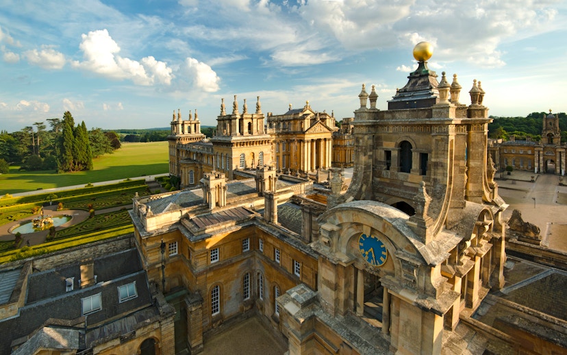 Blenheim Palace exterior with ornate architecture and gardens, Oxfordshire, England.