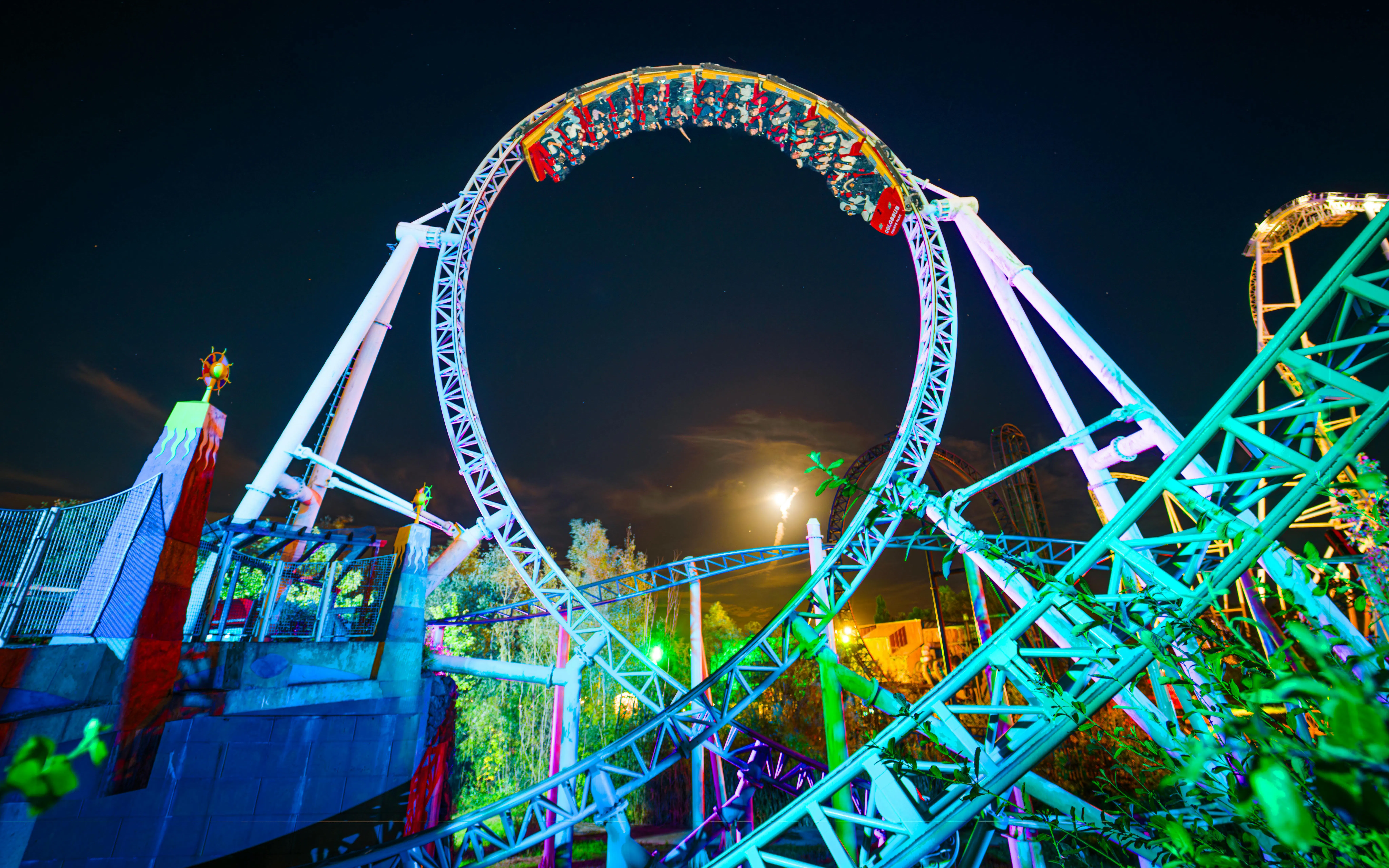 Roller coaster loop at night during Thorpe Park Fright Nights.