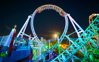 Roller coaster loop at night during Thorpe Park Fright Nights.
