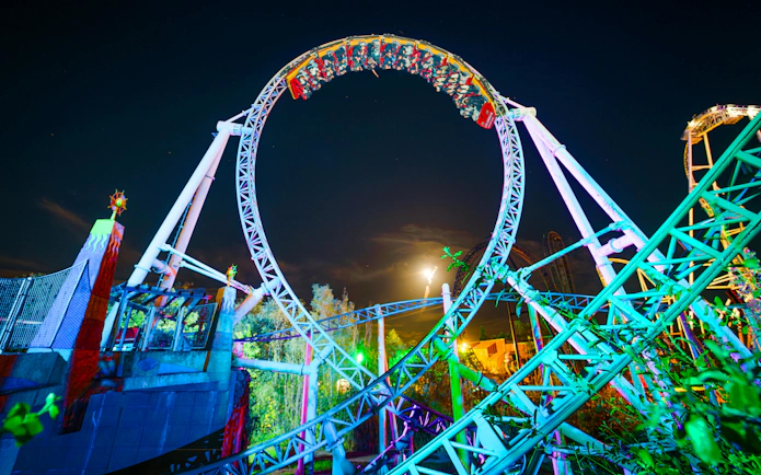 Roller coaster loop at night during Thorpe Park Fright Nights.