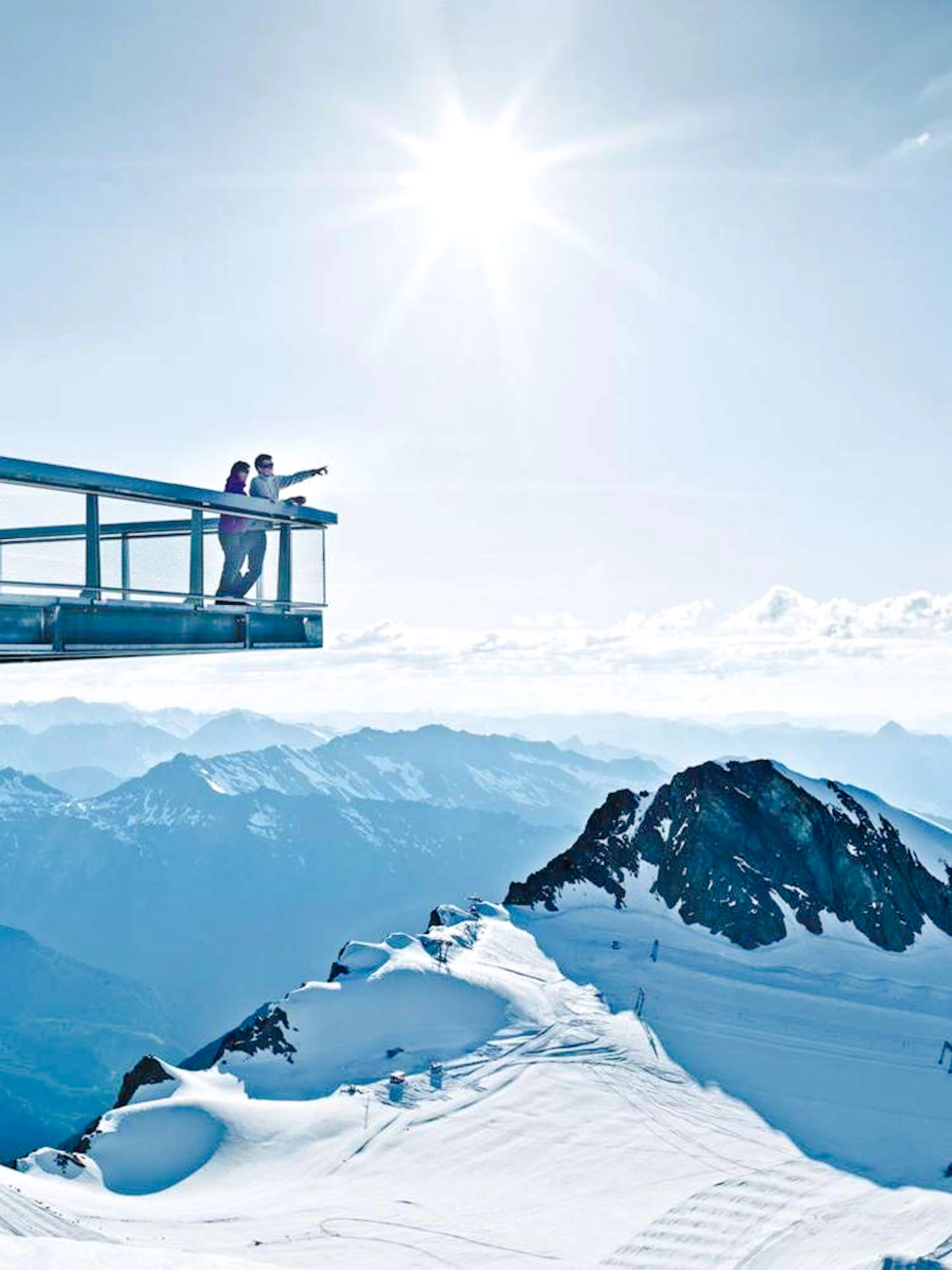 Viewing platform overlooking snowy peaks at Kitzsteinhorn, Zell am See, Salzburg.