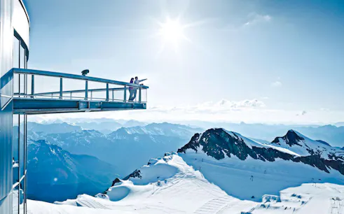 Viewing platform overlooking snowy peaks at Kitzsteinhorn, Zell am See, Salzburg.