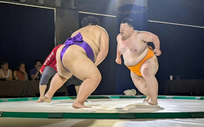 Sumo wrestlers practicing at Ochiizumibeya in Tokyo, Japan.