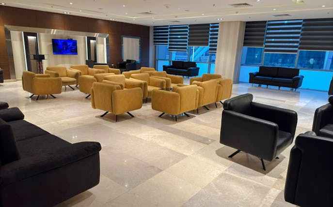 Sofa and chairs at Plaza Premium Lounge, Cairo airport.