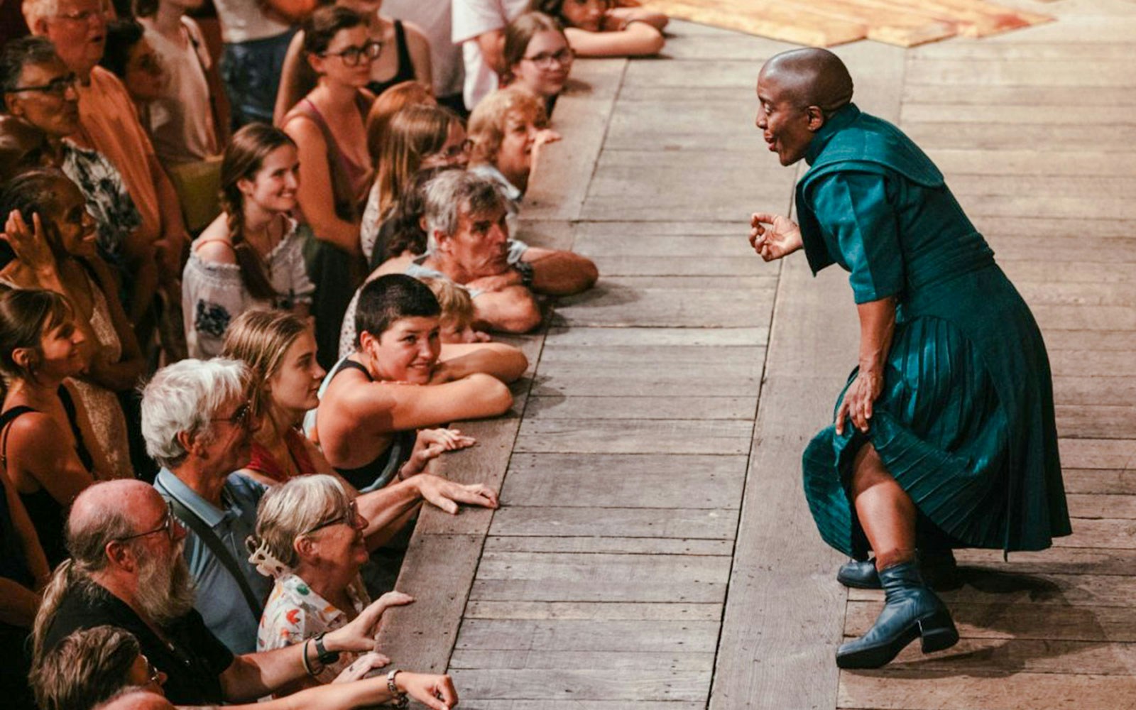Performer engaging with audience during Twelfth Night, or What You Will.