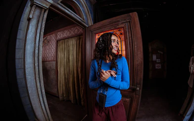 Visitor exploring Netflix's Stranger Things playhouse in Dallas.