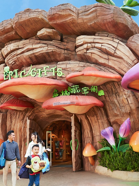 Family at the entrance of a themed gift shop at Genting SkyWorld Outdoor Theme Park.