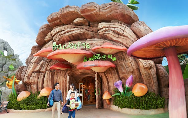 Family at the entrance of a themed gift shop at Genting SkyWorld Outdoor Theme Park.