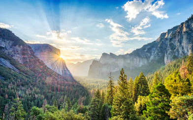 Sunrise over Yosemite Valley from Tunnel View, highlighting El Capitan and Half Dome.