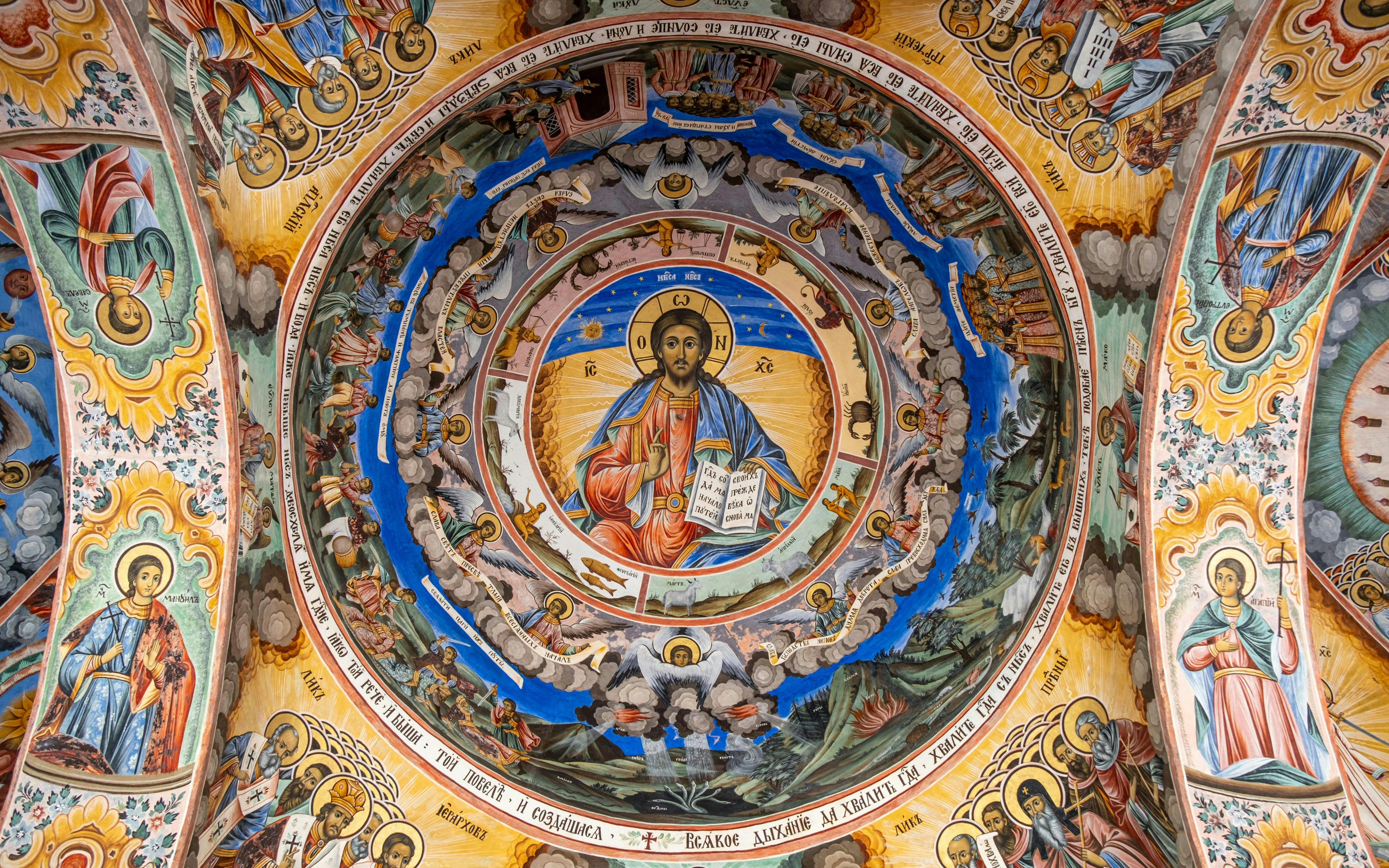 Richly decorated frescoes on the ceiling of Rila Monastery, Rila Mountains, Bulgaria.