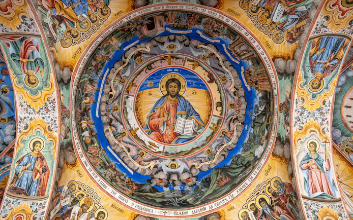 Richly decorated frescoes on the ceiling of Rila Monastery, Rila Mountains, Bulgaria.