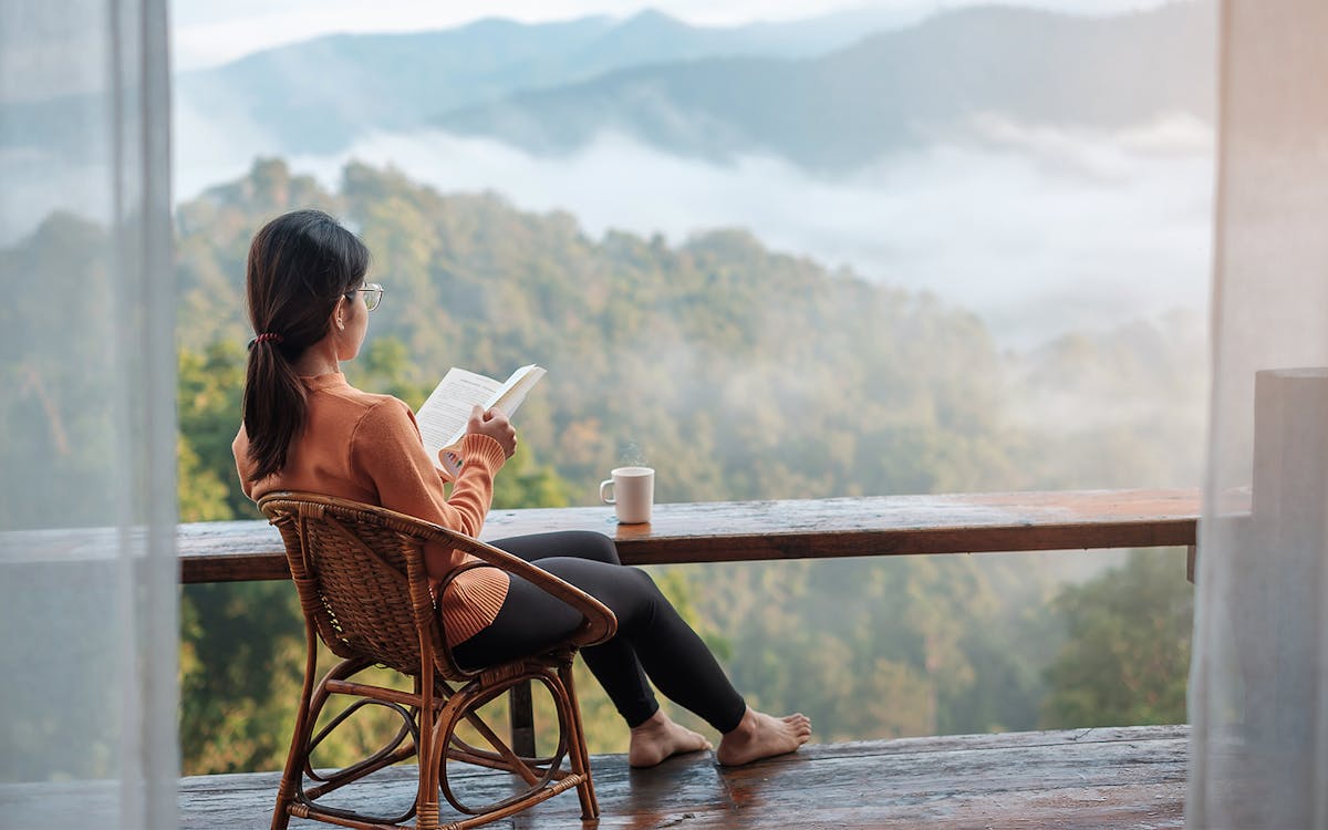 Traditional homestay in lush countryside, promoting sustainable travel through Airbnb.