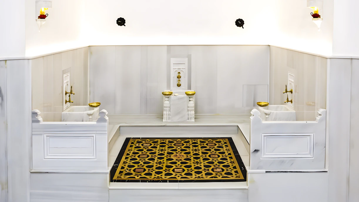 Hürrem Sultan Luxury Hamam interior with marble basins and ornate floor design near Hagia Sophia.