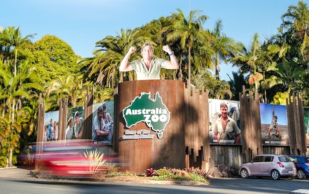 Australia Zoo entrance with iconic Crocodile Hunter signage and lush greenery.