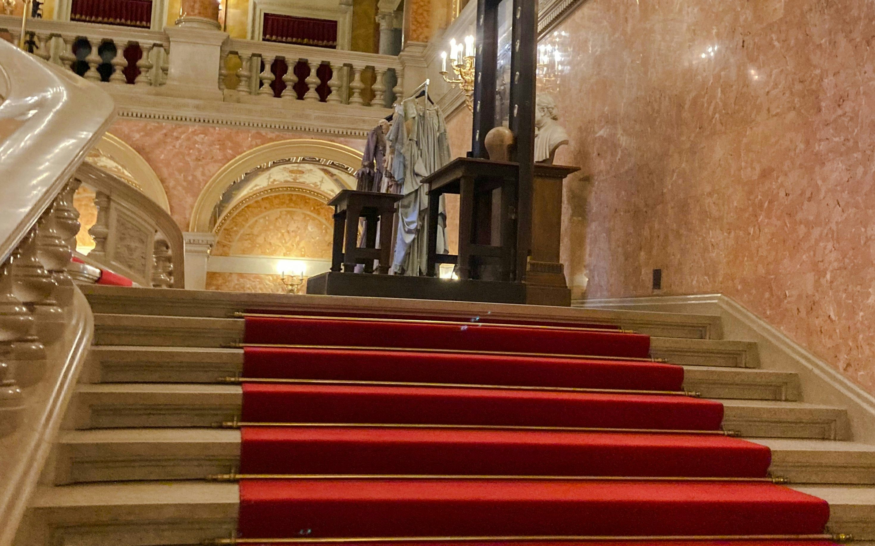 Grand Staircase with red carpet in Hungarian State Opera, Budapest.