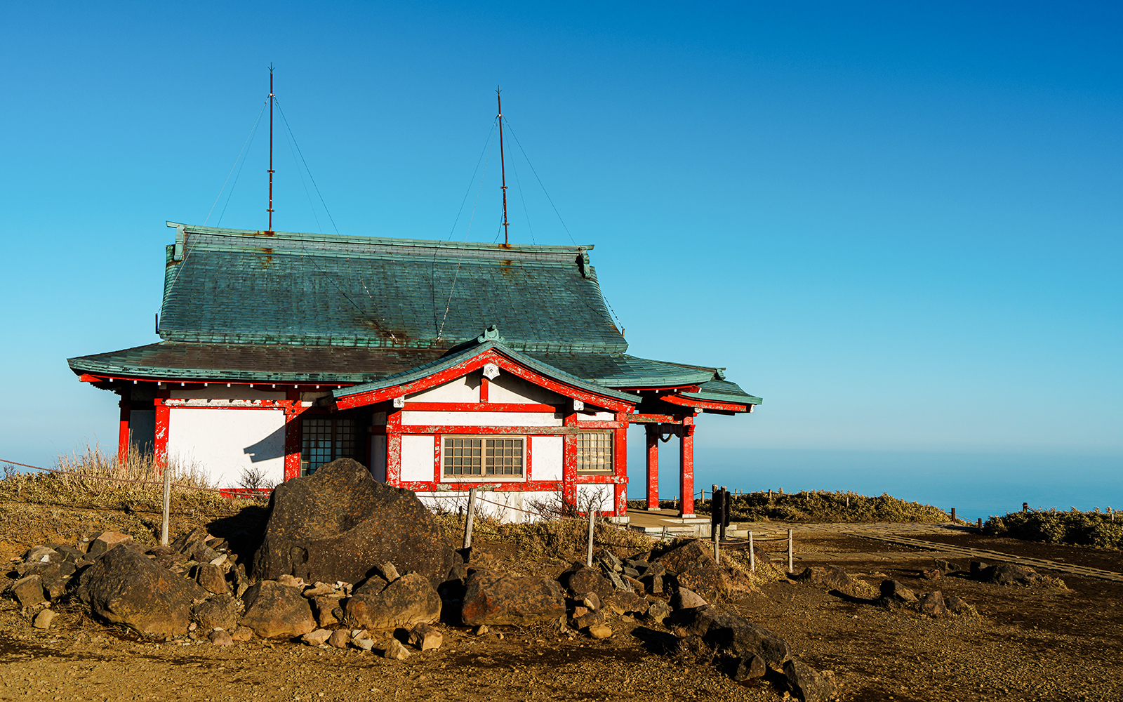 Hakone Mototsumiya Shrine on Mount Komagatake Summit with clear blue sky.
