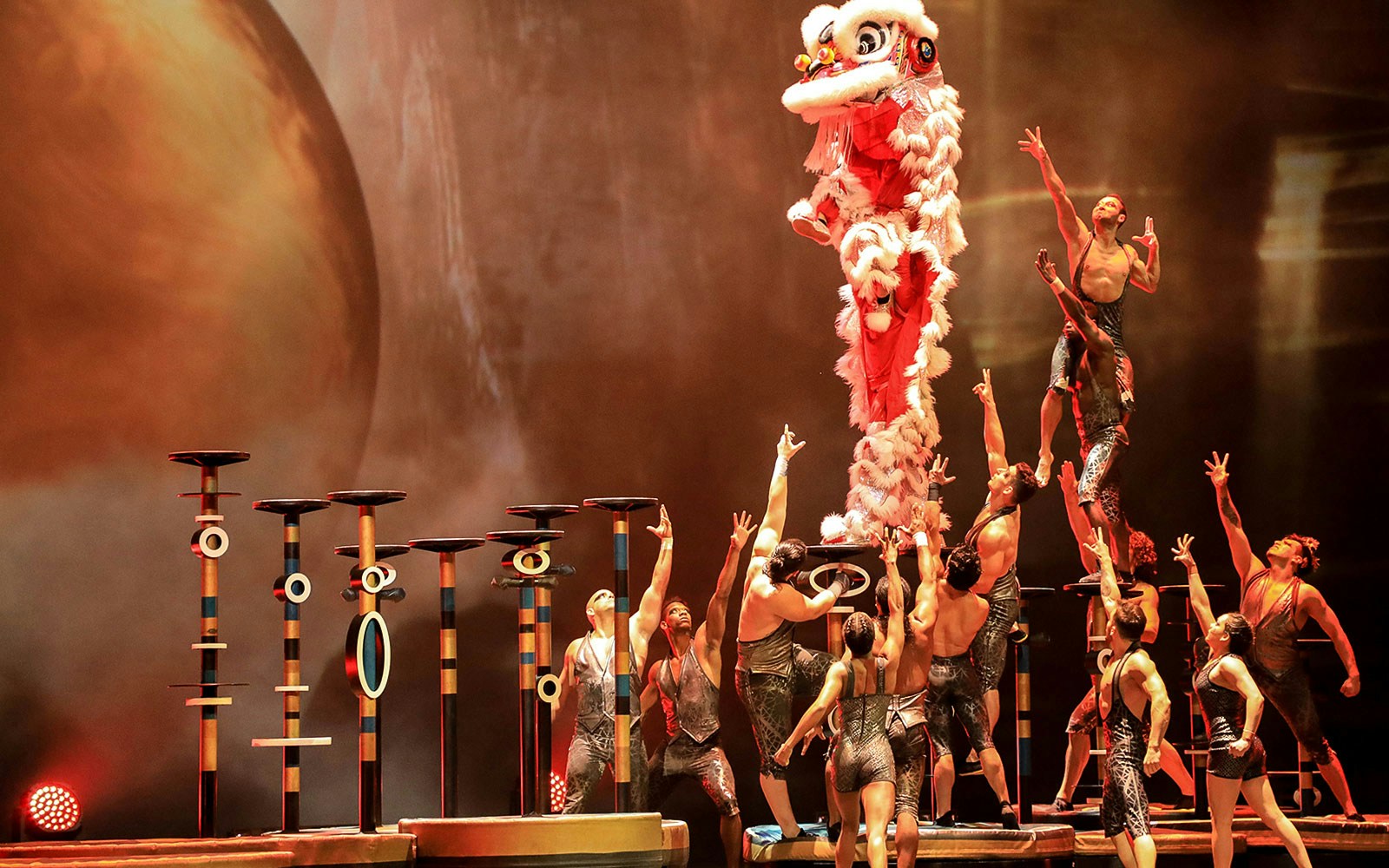 Acrobats performing a dragon dance at La Perle by Dragone in Dubai.