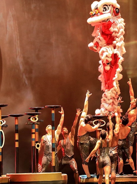 Acrobats performing a dragon dance at La Perle by Dragone in Dubai.