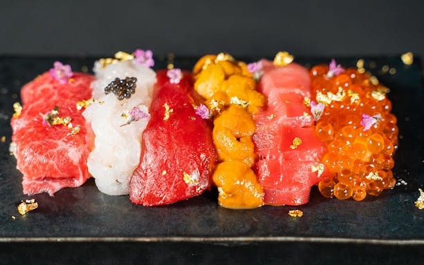 Assorted sushi pieces with caviar, uni, and roe from SUSHIROKU's Sushi 6 Special Course.