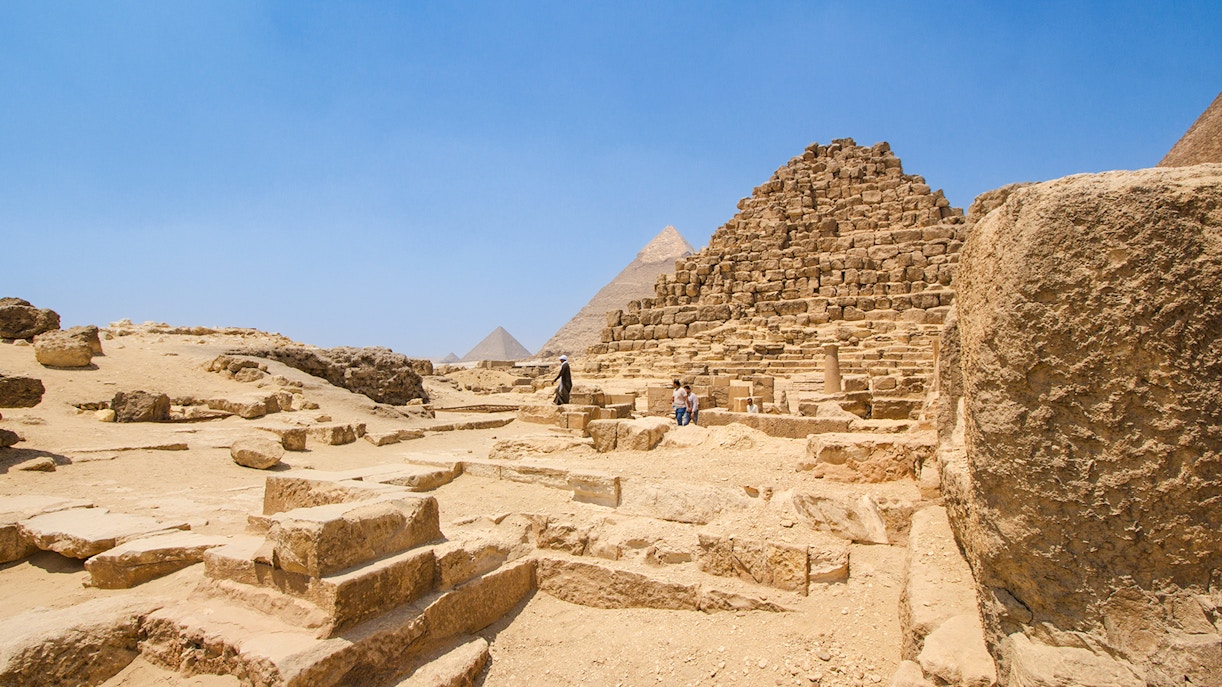 Giza Pyramid Complex with Khufu, Khafre, and Menkaure pyramids near Queen Hetepheres' tomb.