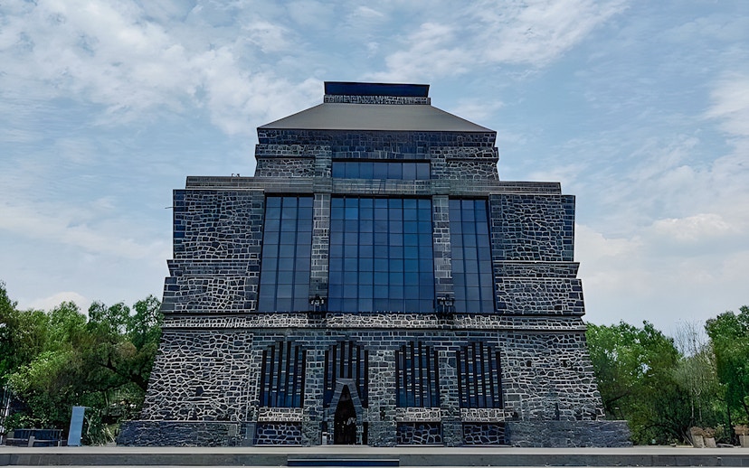 Anahuacalli Museum stone facade with large windows in Mexico City.