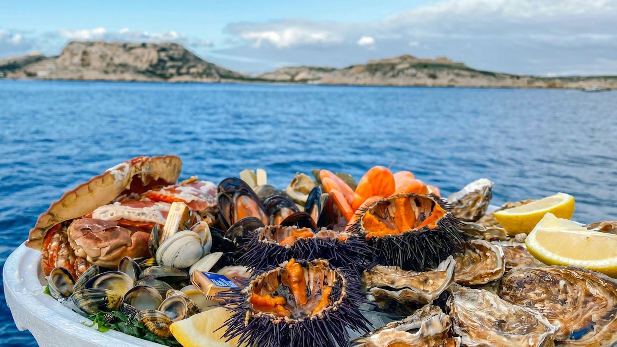 Seafood platter on excursion boat in Calanques de Cassis, France.