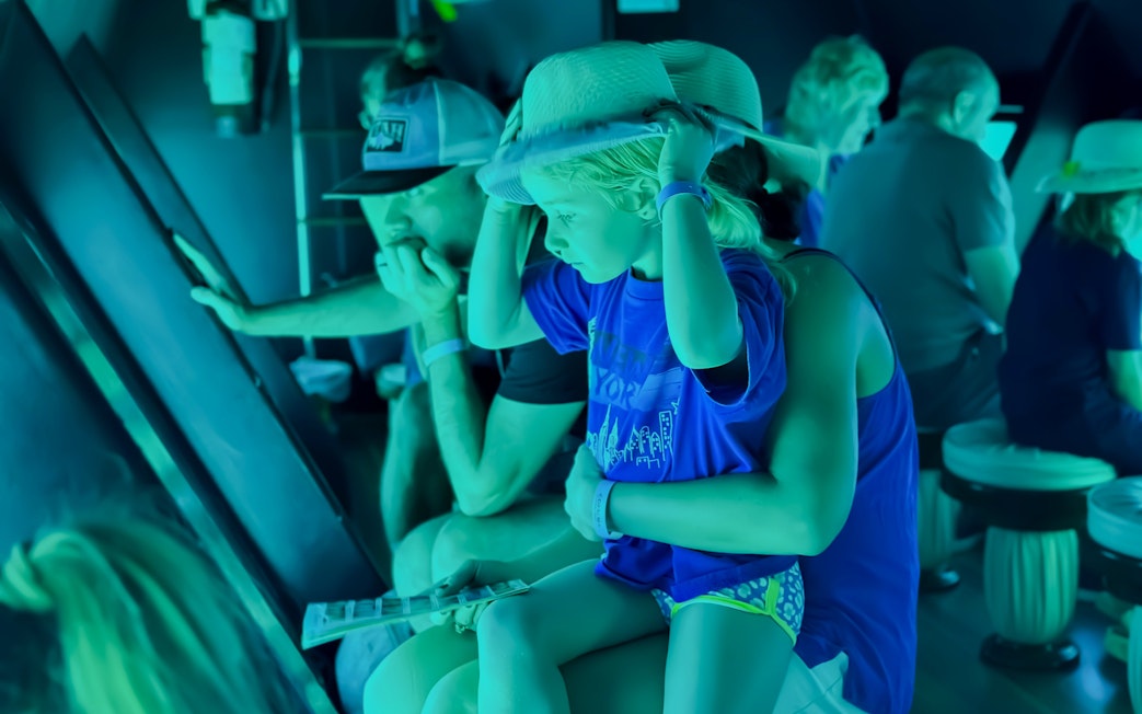 Family with kids viewing fish on Royal Seascope Submarine, Hurghada.