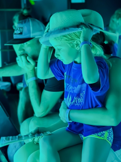 Family with kids viewing fish on Royal Seascope Submarine, Hurghada.