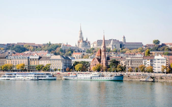 Buda Castle and Matthias Church viewed from the Danube River, Budapest.