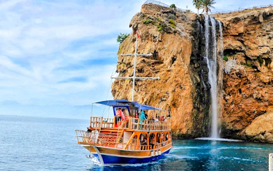Antalya Coast Boat Cruise to Duden Waterfalls and Lara Beach with Lunch & Soft Drinks
