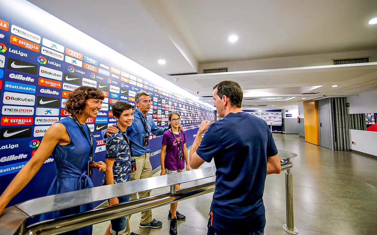 Visitors in the FC Barcelona press room during Camp Nou Experience tour.