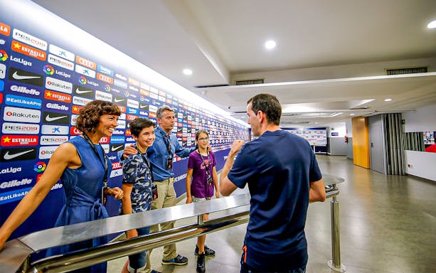 Visitors in the FC Barcelona press room during Camp Nou Experience tour.
