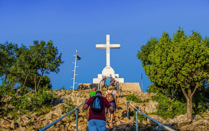 Pilgrims ascending Cross Hill in Medjugorje, Bosnia and Herzegovina.