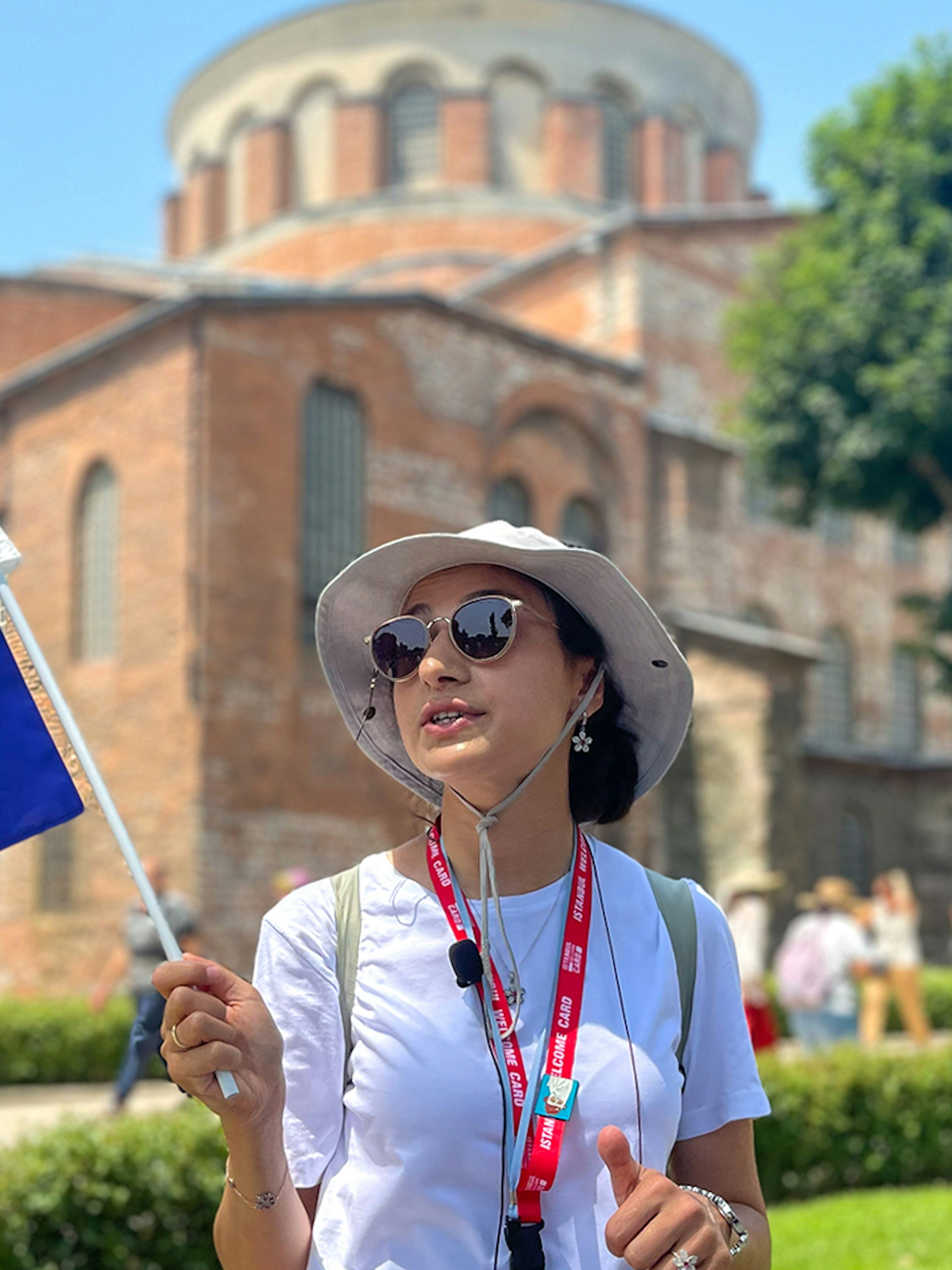 Tour guide leading a group at Topkapi Palace Museum, Istanbul, with skip-the-line access.