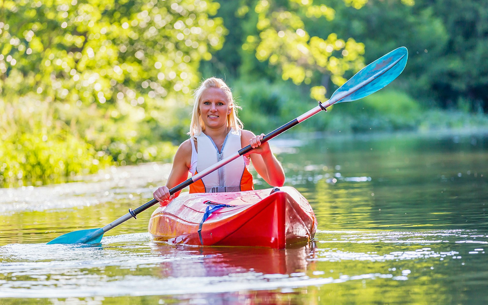 Kayaking on clear waters in Blue Eye, Albania.