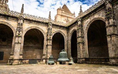 Cloister arcade with bells at Santiago de Compostela Cathedral, Galicia, Spain.